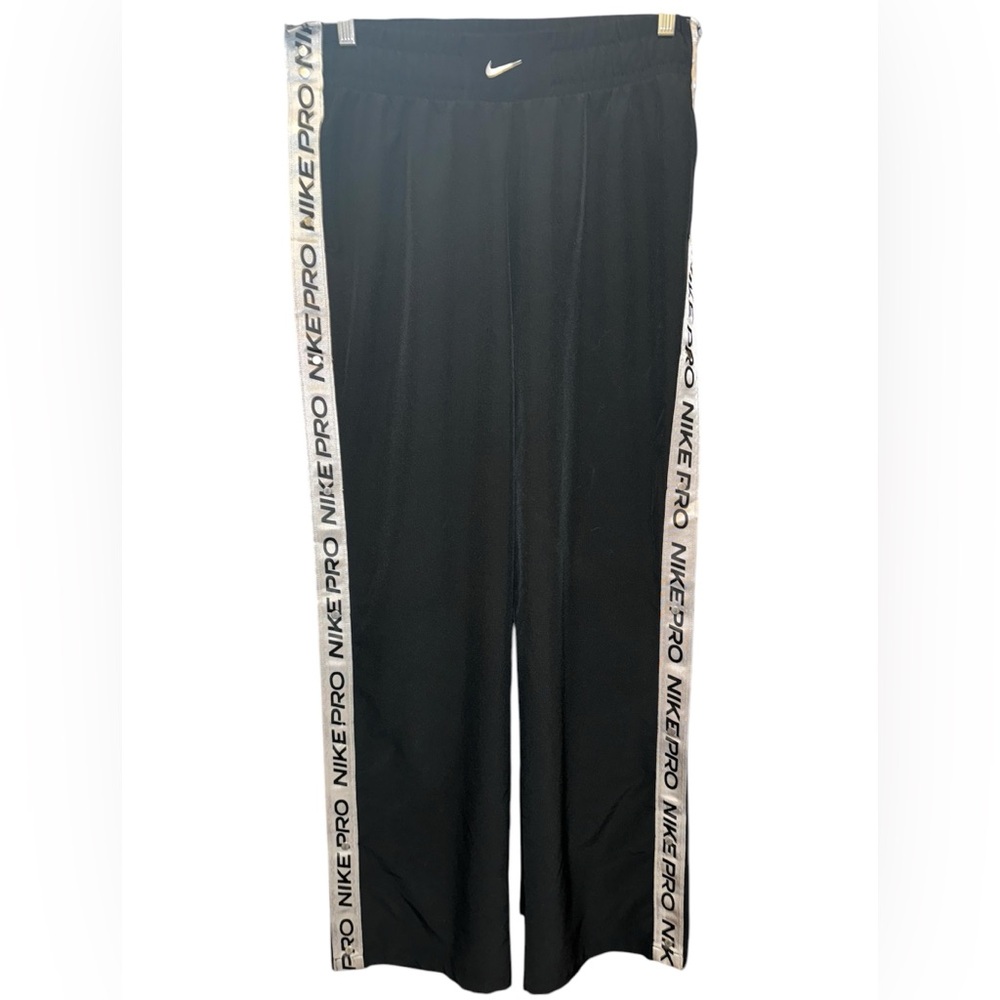Women’s NIKE PRO TEAR-AWAY PANTS size LARGE